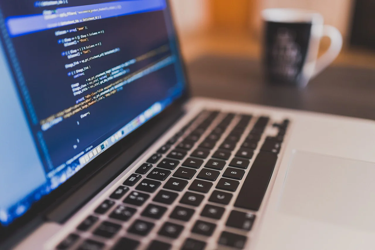 Laptop with code on screen
